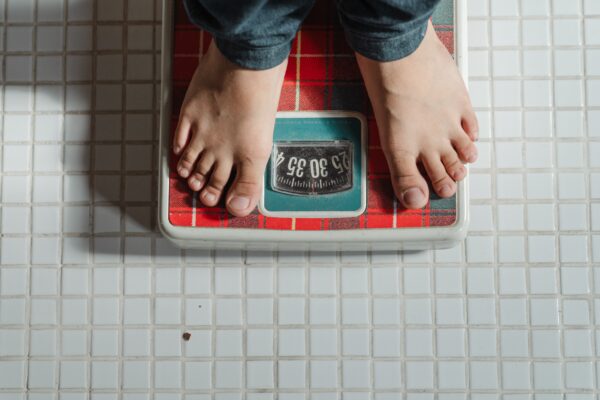 Weighing on scale so you can get paid to lose weight