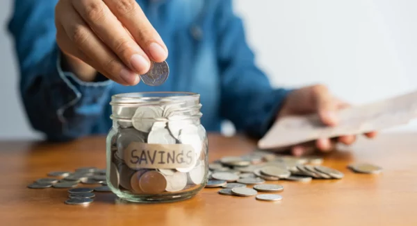 Coins in  a saving jar