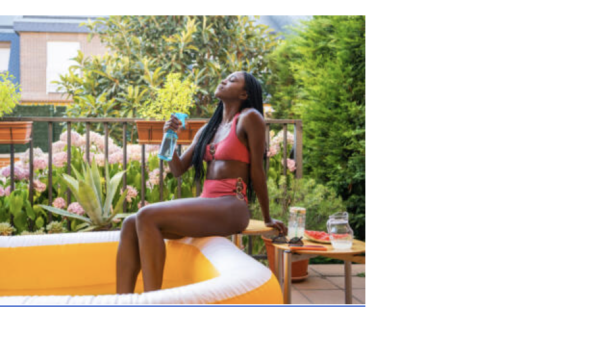 A Black American woman in a water tub