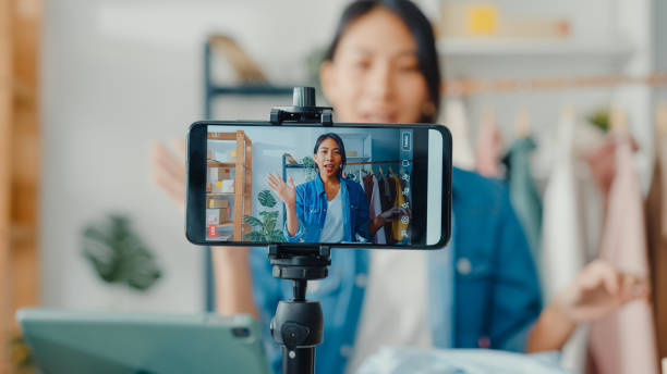 lady using camera shooting video