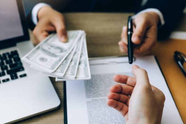 A man Taking a loan to invest in farmland 